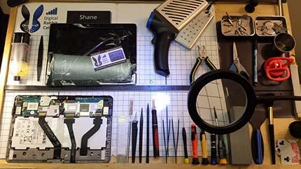 Digital Rabbit Cellular Phone and Tablet Repair Tools on Work Desk